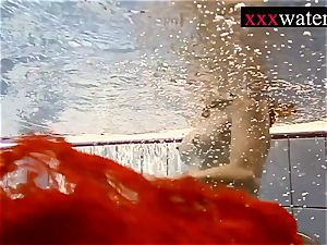 killer red-hot girl swimming in the pool